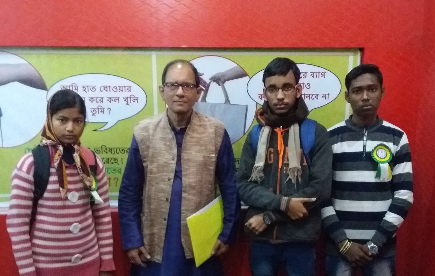 Four students standing with a member of TOREE after a Bidyayan Scholarship ceremony.
