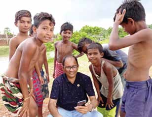 Children in Purba Medinipur after a cyclone Yaas relief distribution.