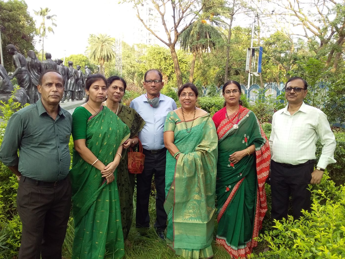 Members of TOREE standing together outdoors.